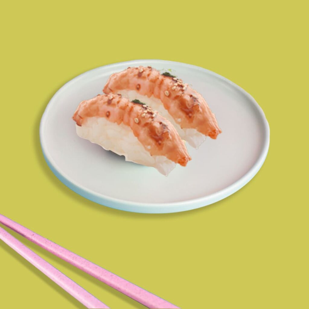 Sushi au saumon flambé, délicatement assaisonné, offrant une saveur fumée unique - spécialité halal de Tastyrice.